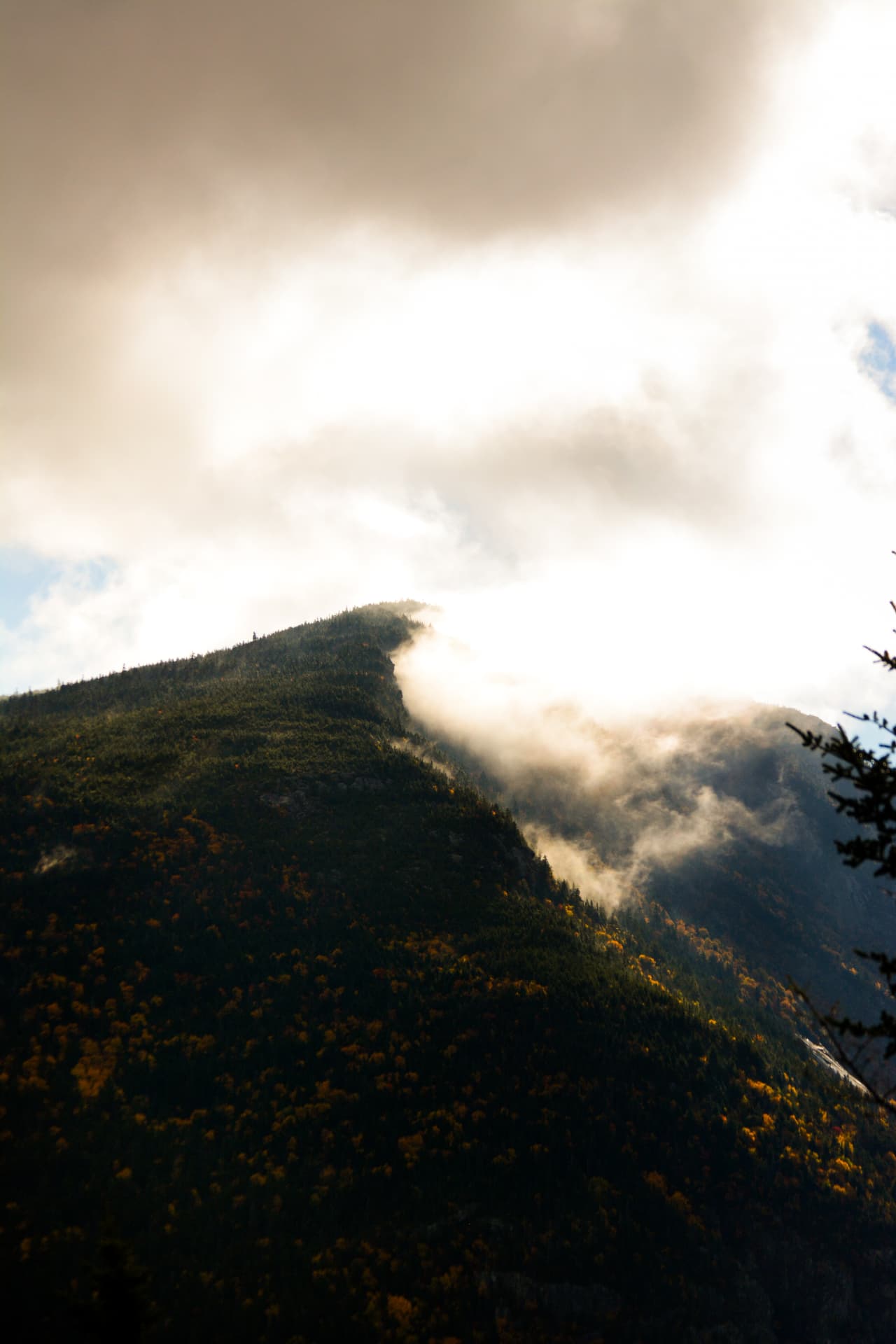 Clouds over a mountain summit